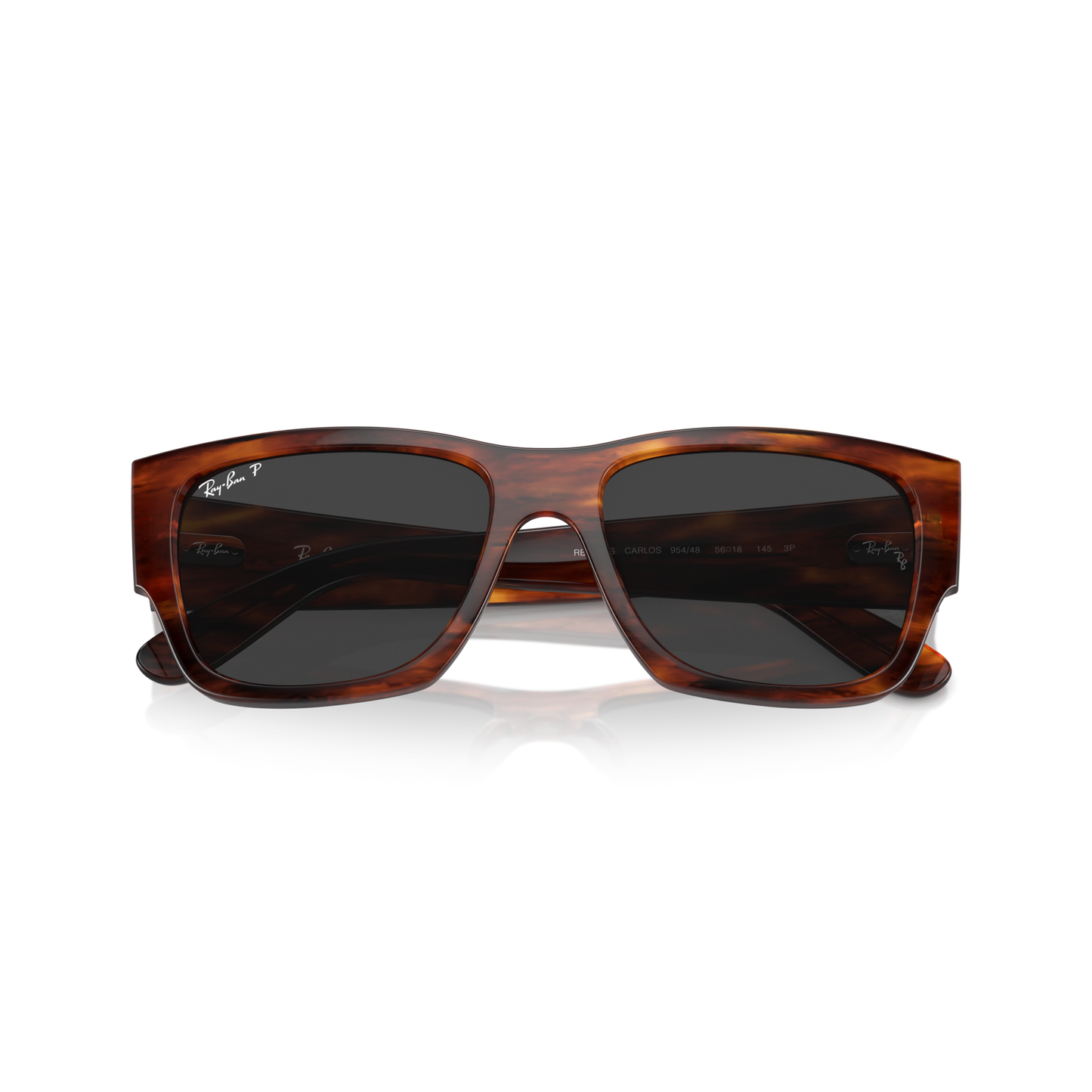 Brown tortoiseshell sunglasses with dark lenses on a white background Polished Striped Havana + Black Polarised