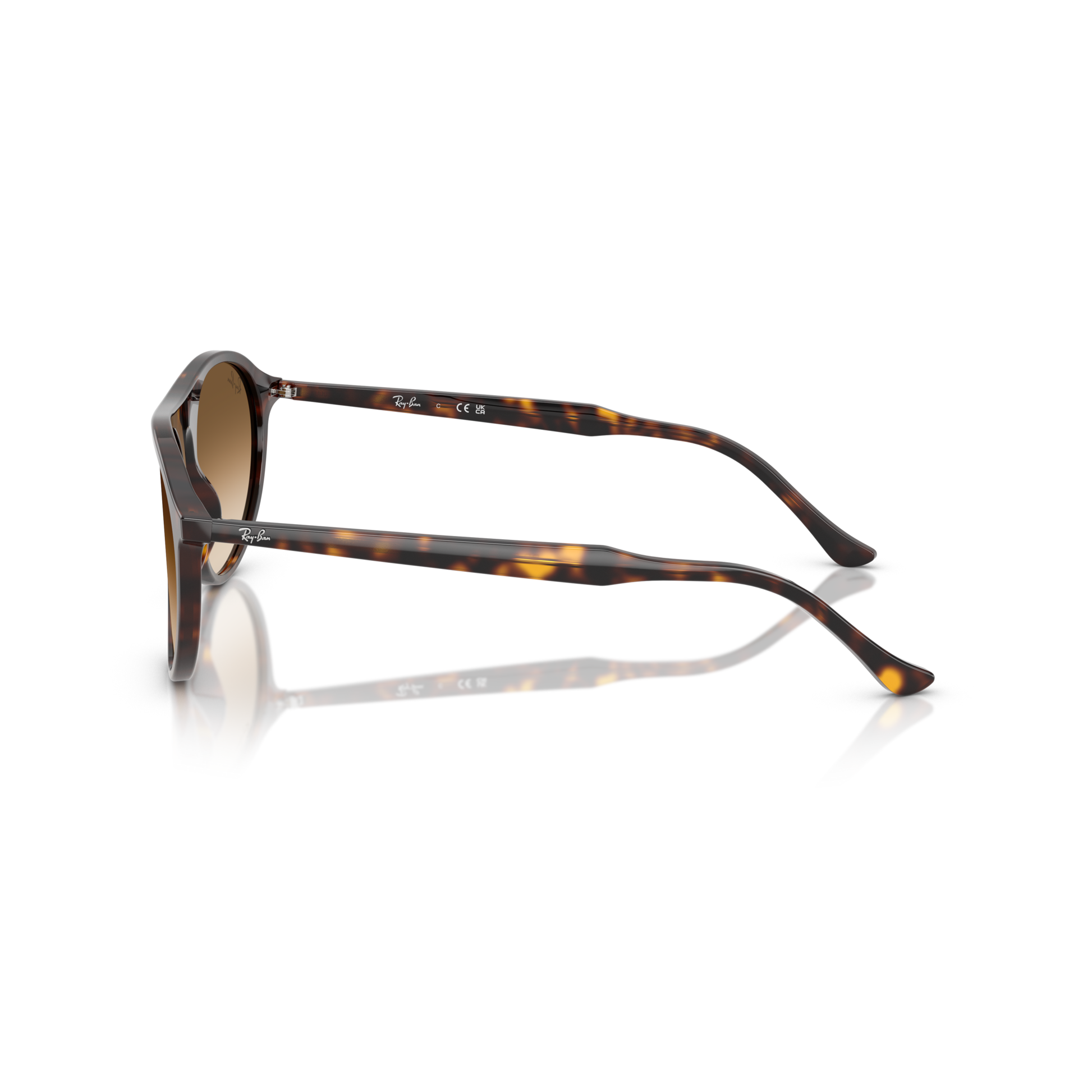 Tortoiseshell sunglasses with reflective surface on a white background Polished Havana + Clear Gradient Brown