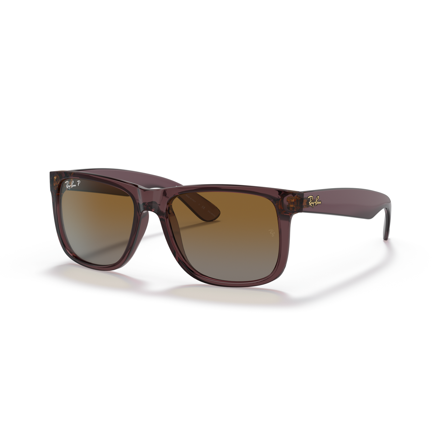 Brown sunglasses with a reflective surface on a white background Polished Transparent Dark Brown + Gradient Brown Polarised