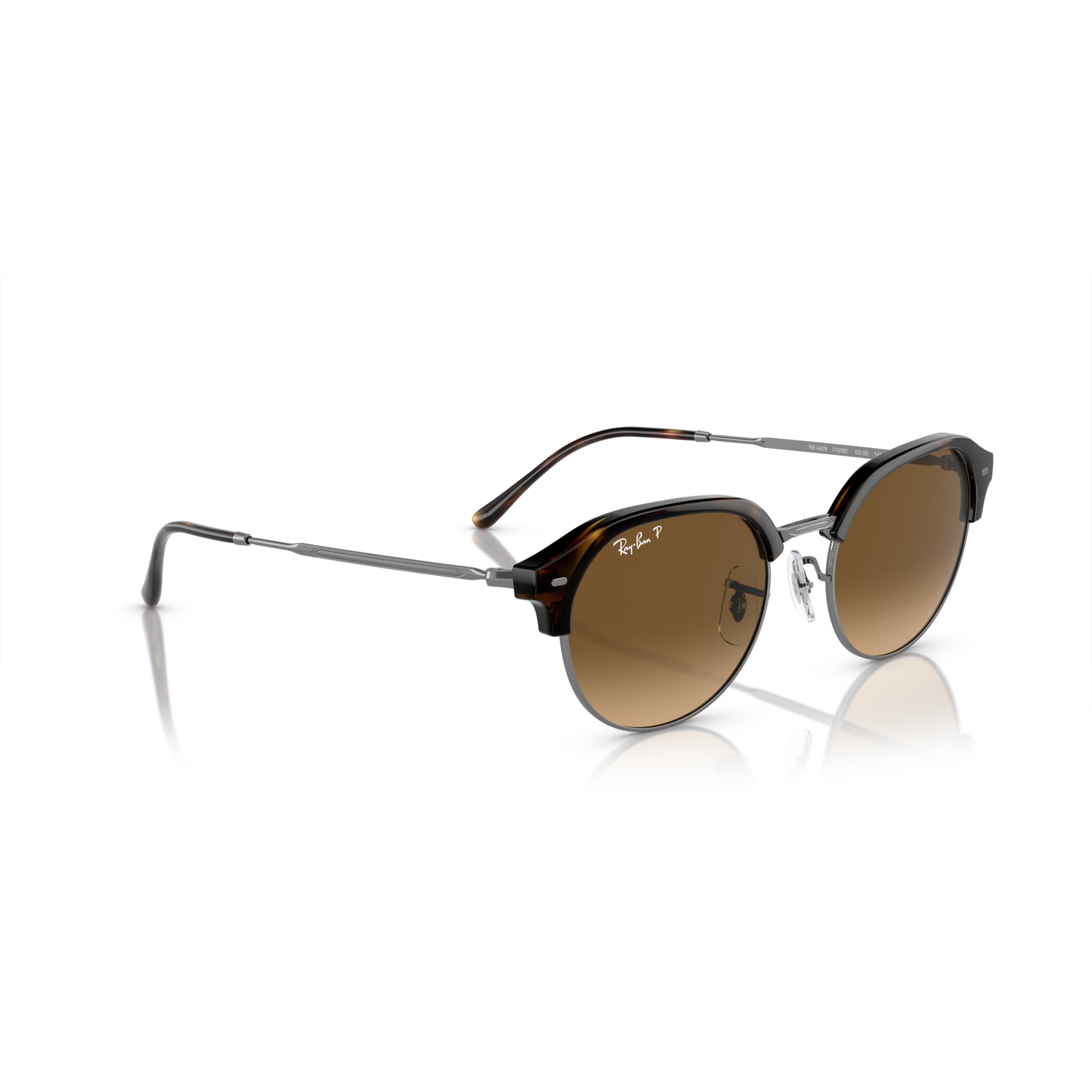 Round sunglasses with brown lenses and black frame on a white background Polished Havana on Gunmetal + Brown Gradient Polarised