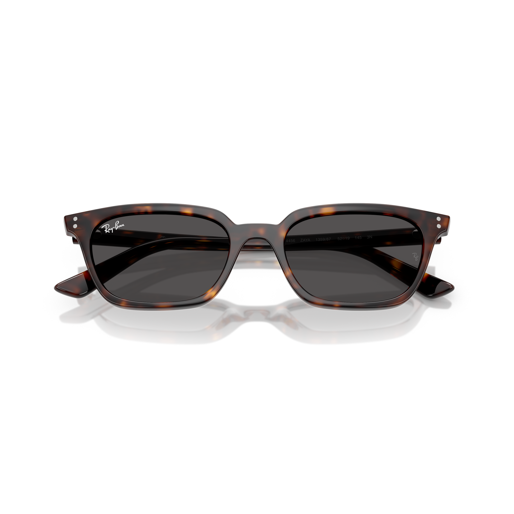 Tortoiseshell sunglasses with dark lenses on a white background Polished Havana + Dark Grey