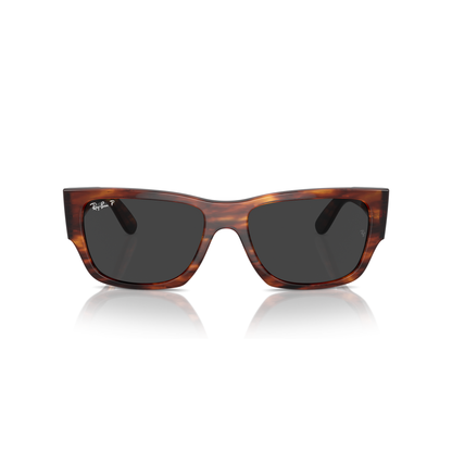 Tortoiseshell sunglasses with dark lenses on a white background Polished Striped Havana + Black Polarised
