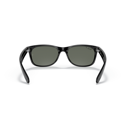 Black sunglasses with dark lenses on a white background Polished Black + G-15 Green Polarised