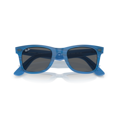 Blue sunglasses with dark lenses on a white background Polished Photo Striped Blue + Dark Grey