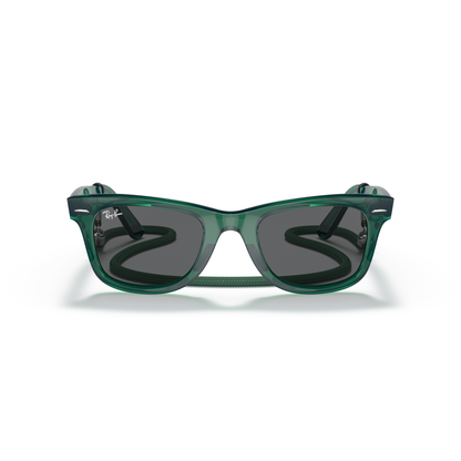 Green sunglasses with a reflective surface on a white background Polished Transparent Green + Dark Grey