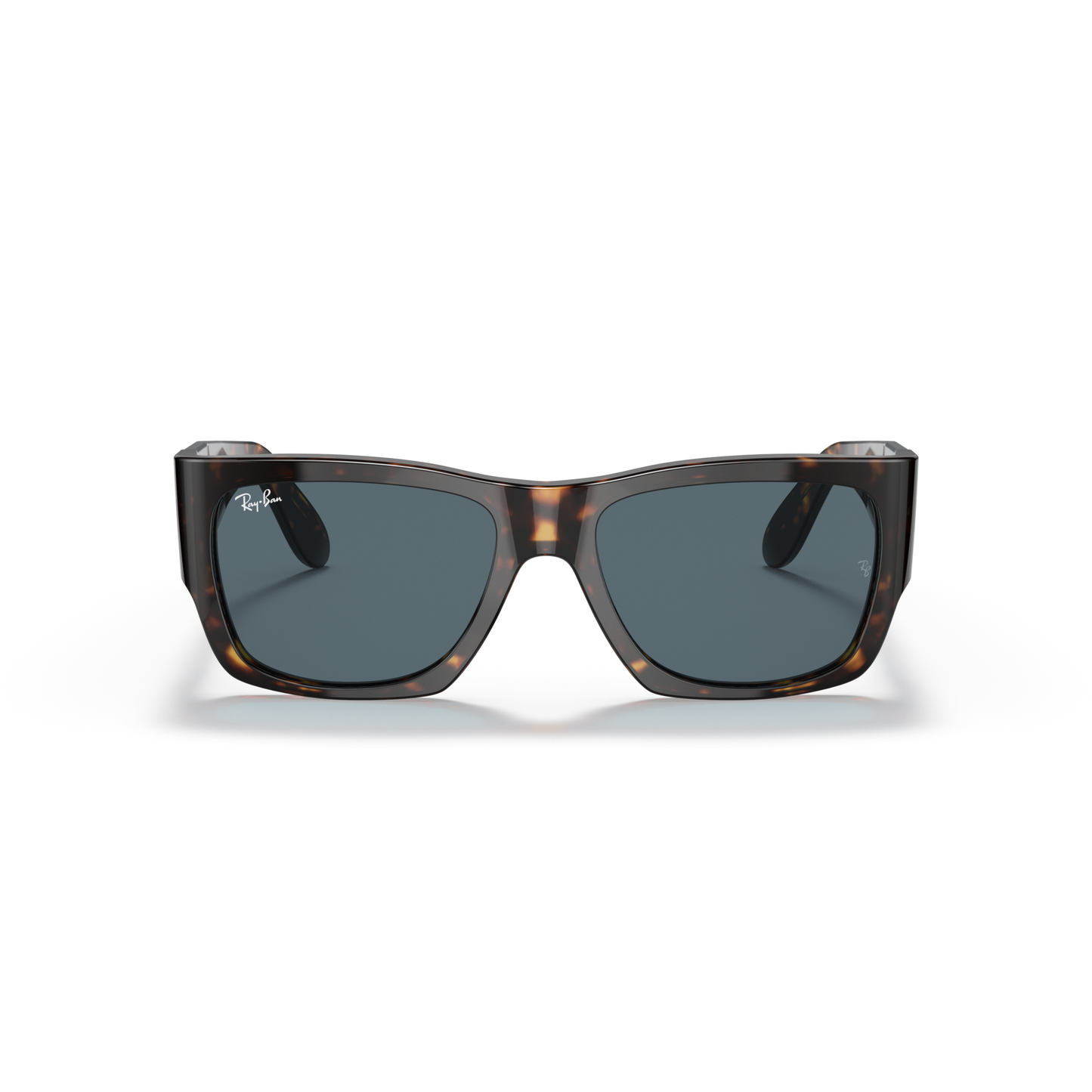 Sunglasses with tortoiseshell frame and dark lenses on a white background Polished Tortoise + Blue