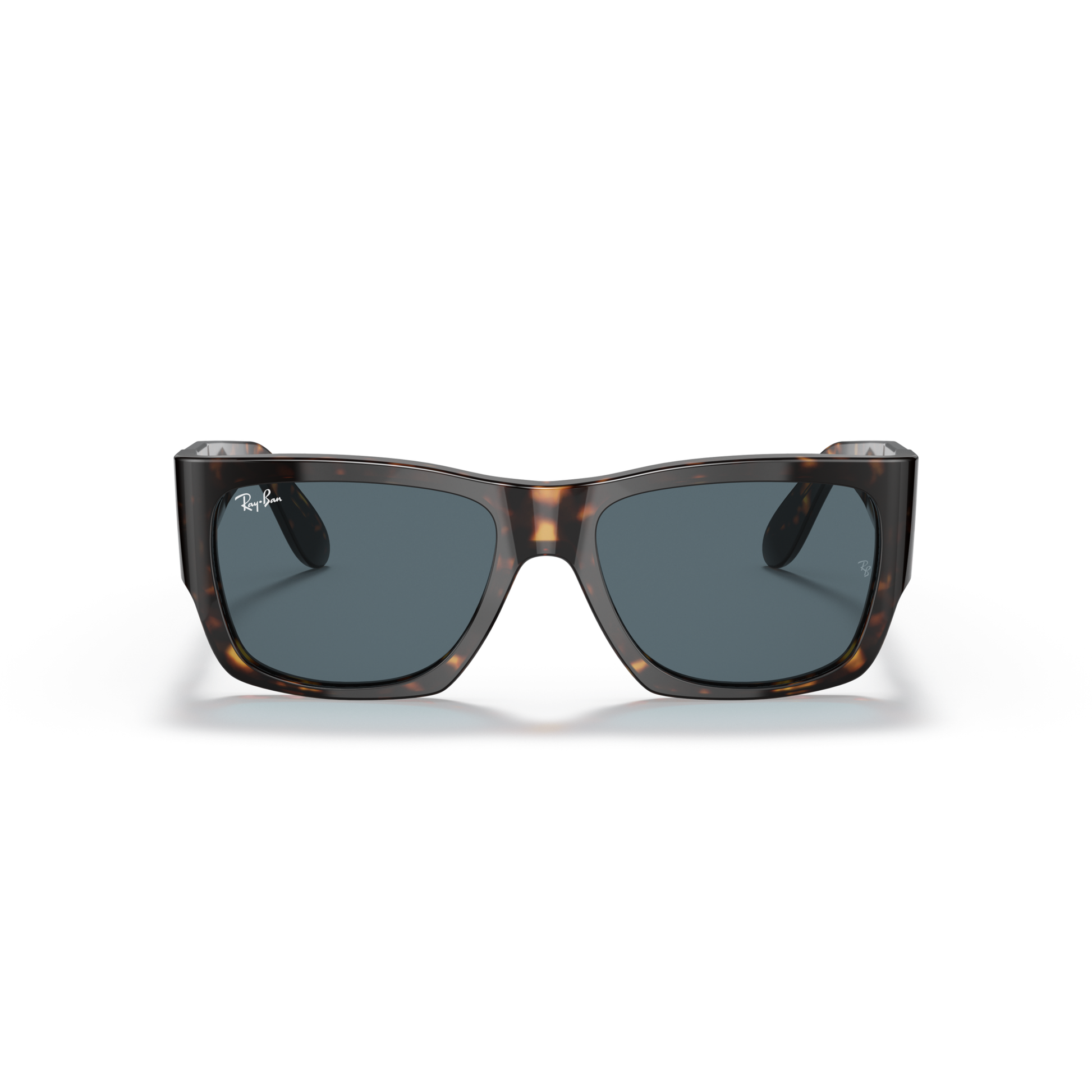 Sunglasses with tortoiseshell frame and dark lenses on a white background Polished Tortoise + Blue