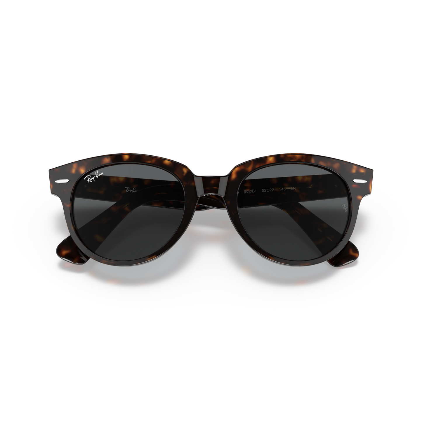 Tortoiseshell sunglasses with dark lenses on a white background Polished Tortoise + Dark Grey