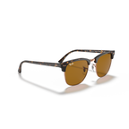 Pair of sunglasses with a tortoiseshell frame on a white background Polished Havana + B-15 Brown