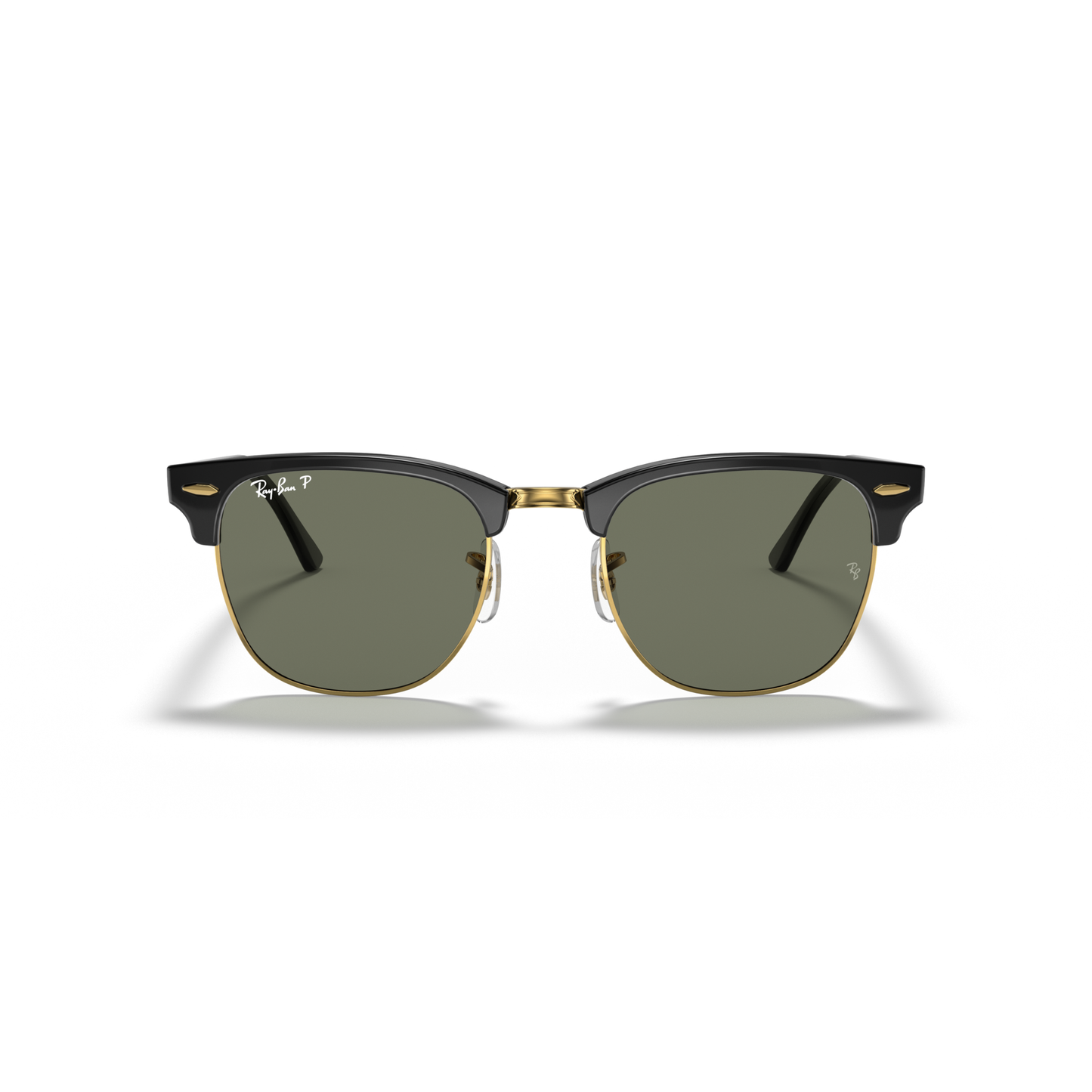 Pair of sunglasses with black frame and green lenses on a white background Polished Black on Gold + G-15 Polarised