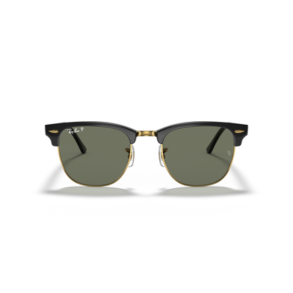 Pair of sunglasses with black frame and green lenses on a white background Polished Black on Gold + G-15 Polarised