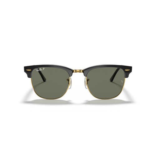 Pair of sunglasses with black frame and green lenses on a white background Polished Black on Gold + G-15 Polarised
