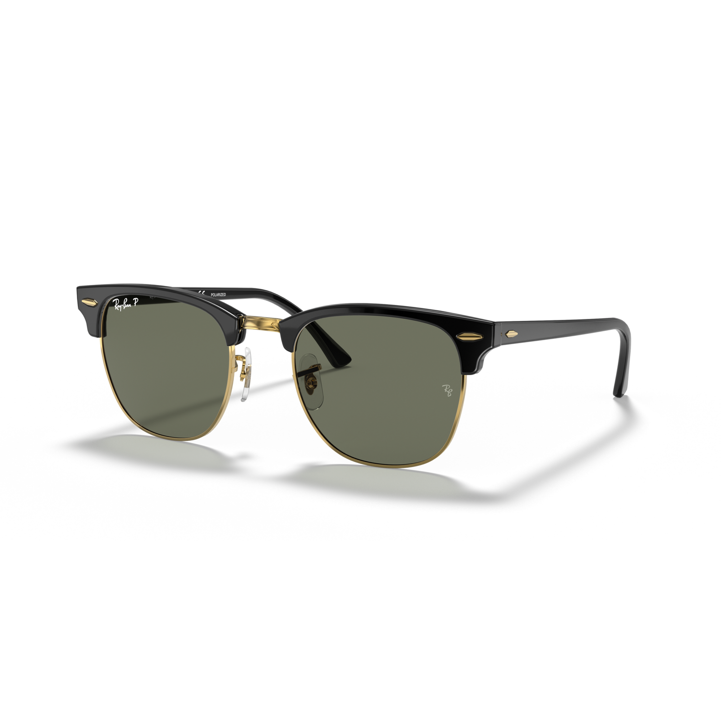 Black and gold sunglasses with green lenses on a white background Polished Black on Gold + G-15 Polarised