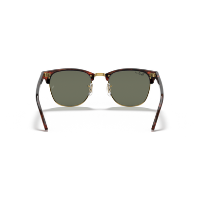 Sunglasses with tortoiseshell frame and green lenses on a white background Polished Tortoise on Gold + G-15 Polarised