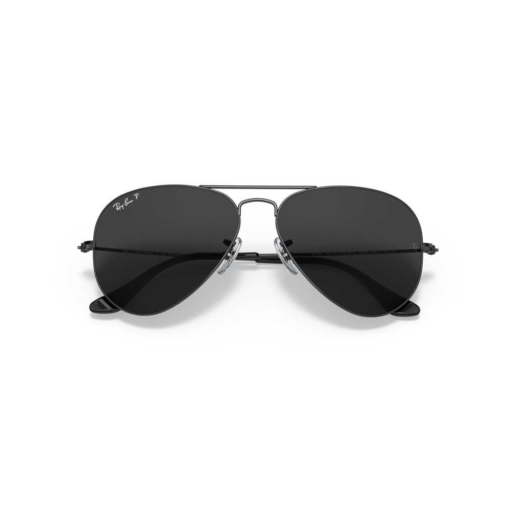 Black aviator sunglasses on a white background Polished Black + Black Polarised