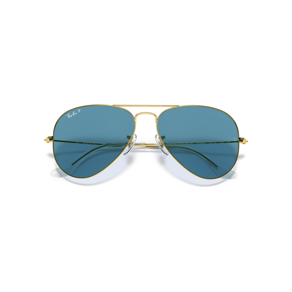 Sunglasses with gold frame and blue lenses on a white background Legend Gold + Blue Polarised