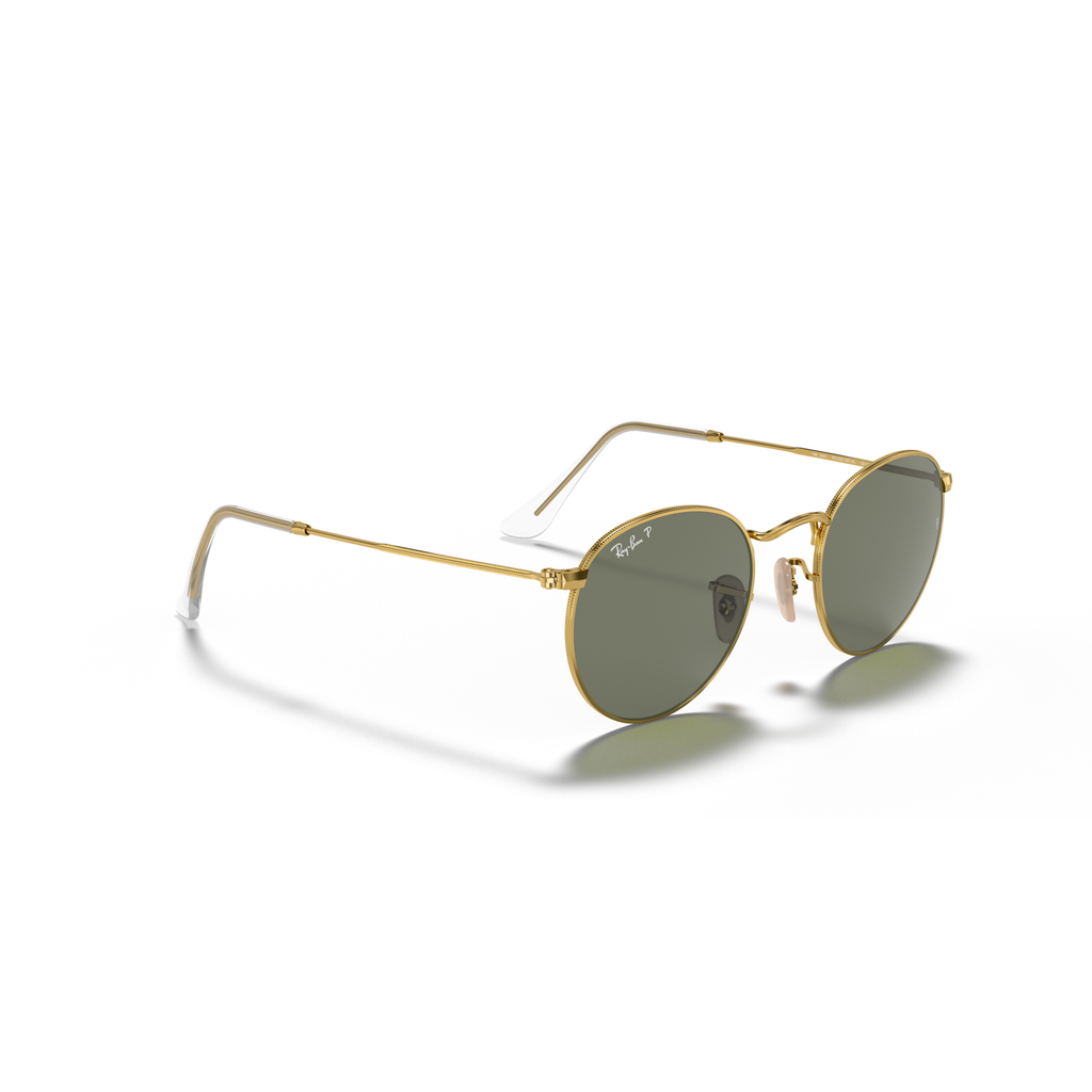 Gold-framed sunglasses with green lenses on a white background Polished Arista Gold + G-15 Green Polarised
