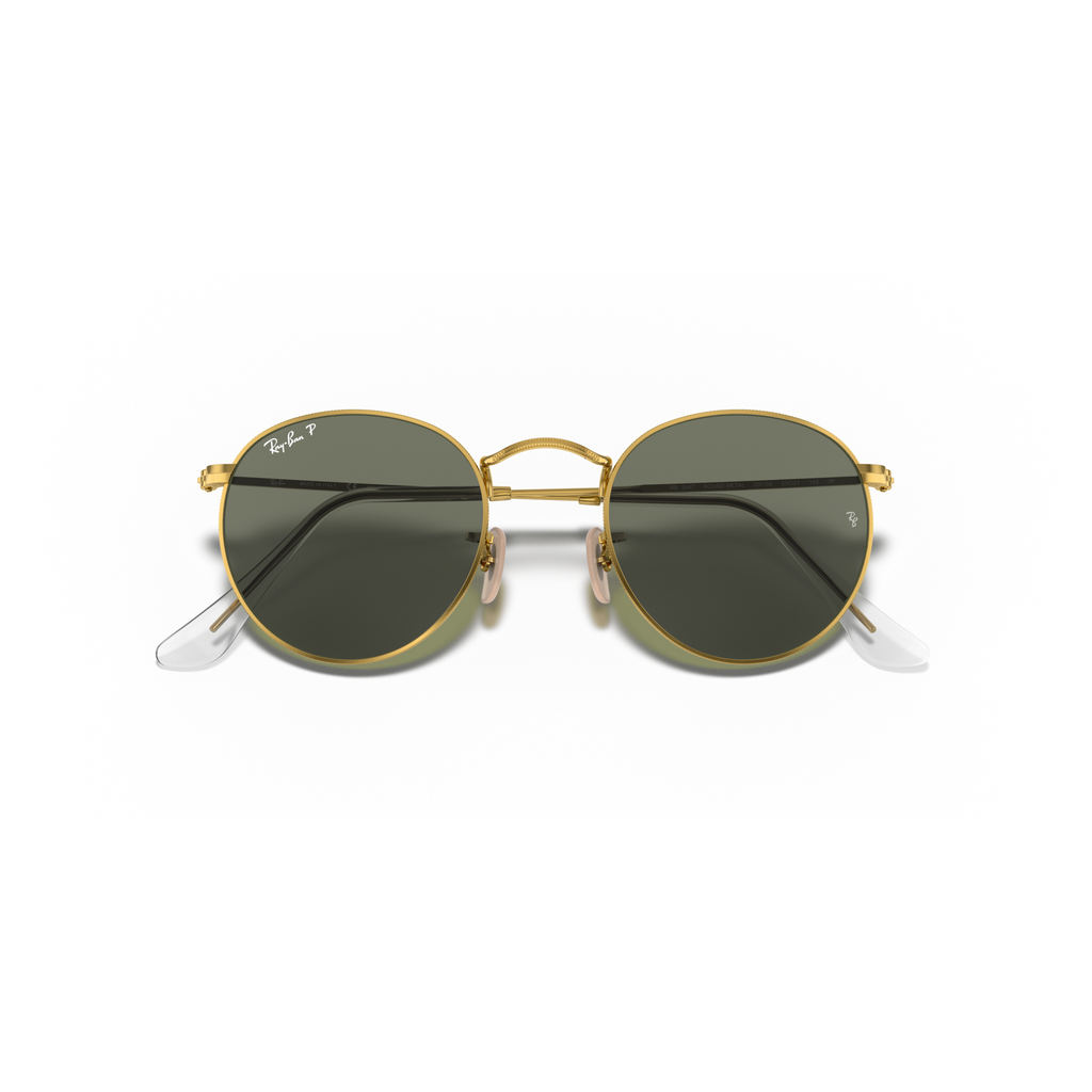 Gold-framed sunglasses with dark lenses on a white background Polished Arista Gold + G-15 Green Polarised