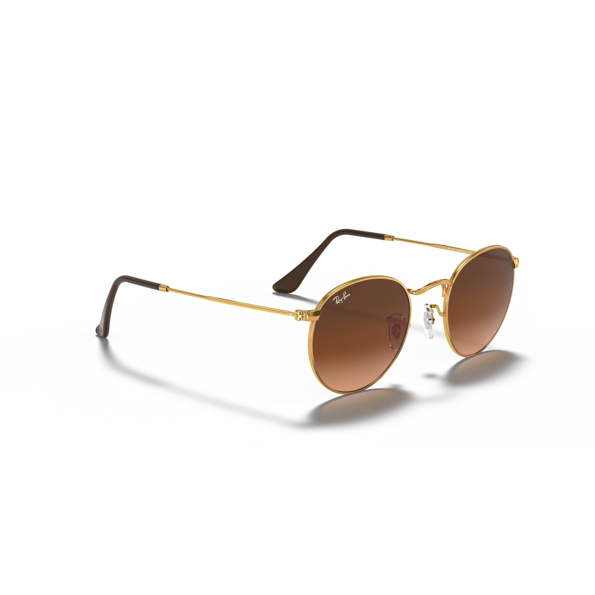 Gold-framed sunglasses with brown lenses on a white background Polished Light Bronze + Pink/Brown Gradient