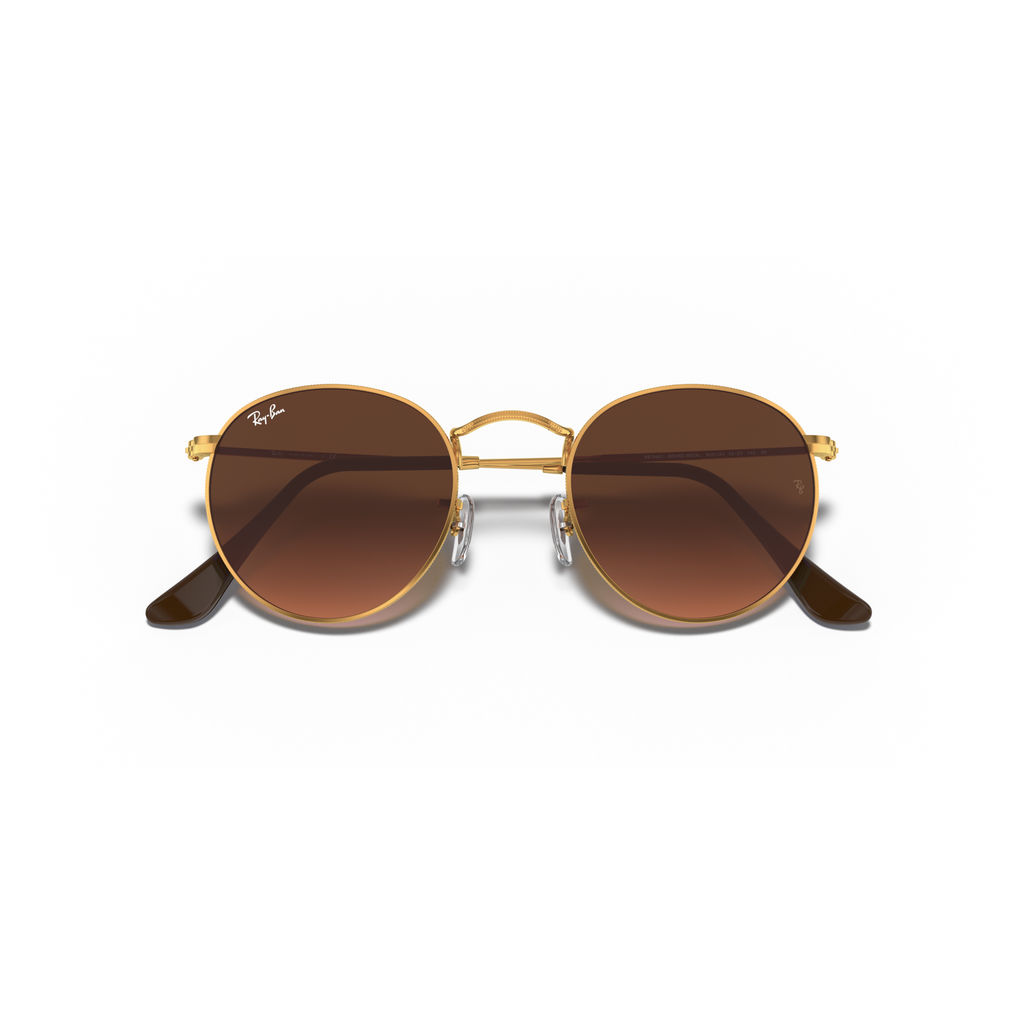 Gold-framed sunglasses with brown lenses on a white background Polished Light Bronze + Pink/Brown Gradient