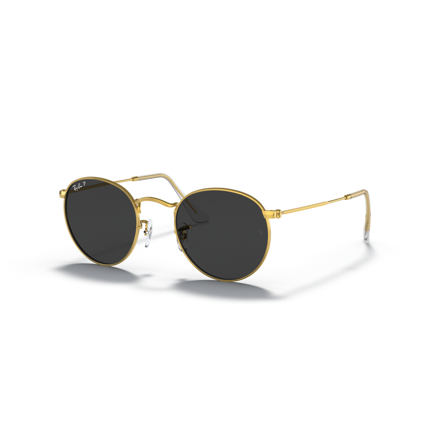 Round sunglasses with gold frame and dark lenses on a white background Polished Gold + Black Polarised