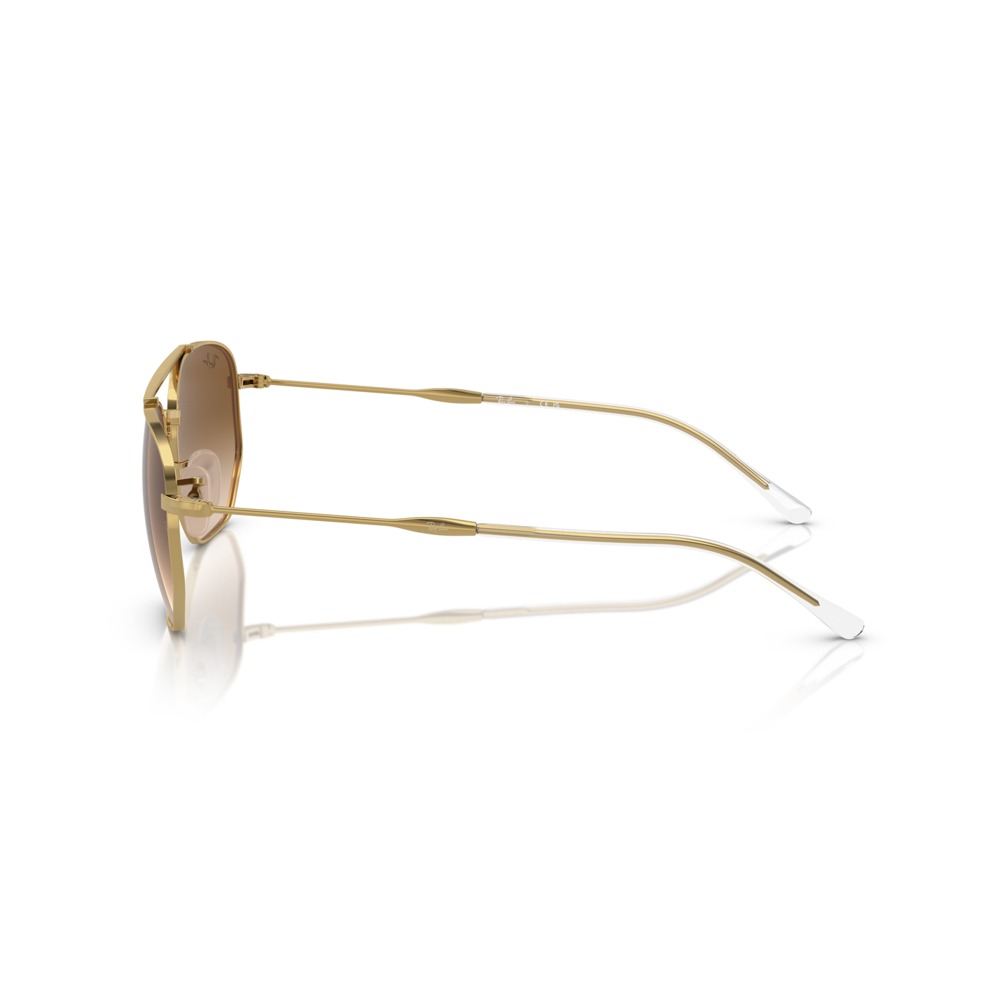 Gold-framed sunglasses on a white background Polished Arista Gold + Clear Gradient Brown