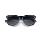 Black sunglasses with a white background Polished Transparent Blue + Gradient Grey Polarised
