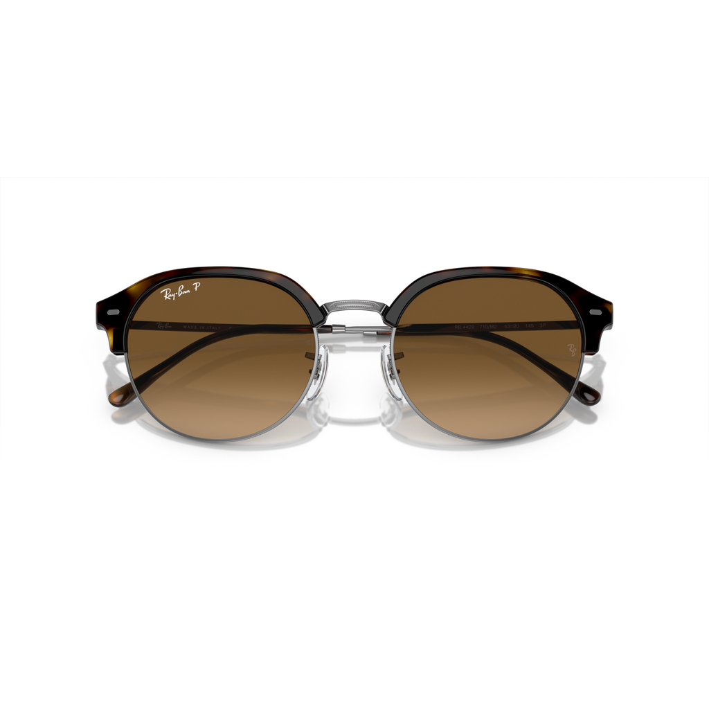 Round sunglasses with brown lenses and a clear frame on a white background Polished Havana on Gunmetal + Brown Gradient Polarised