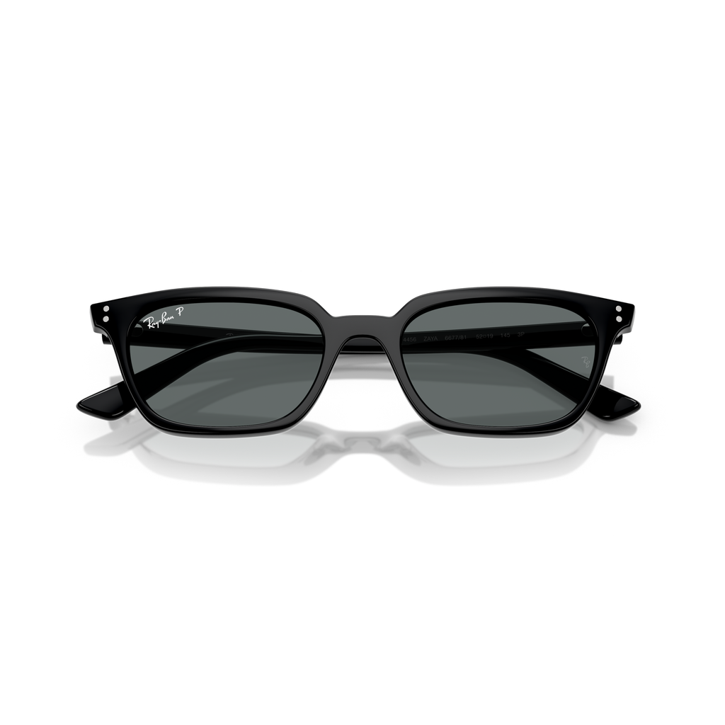 Black sunglasses with a reflective surface on a white background Polished Black + Dark Grey Polarised