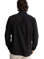 Man wearing a black shirt on a white background