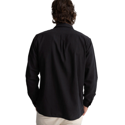 Man wearing a black shirt on a white background