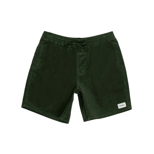 Green shorts with a brand label on a white background