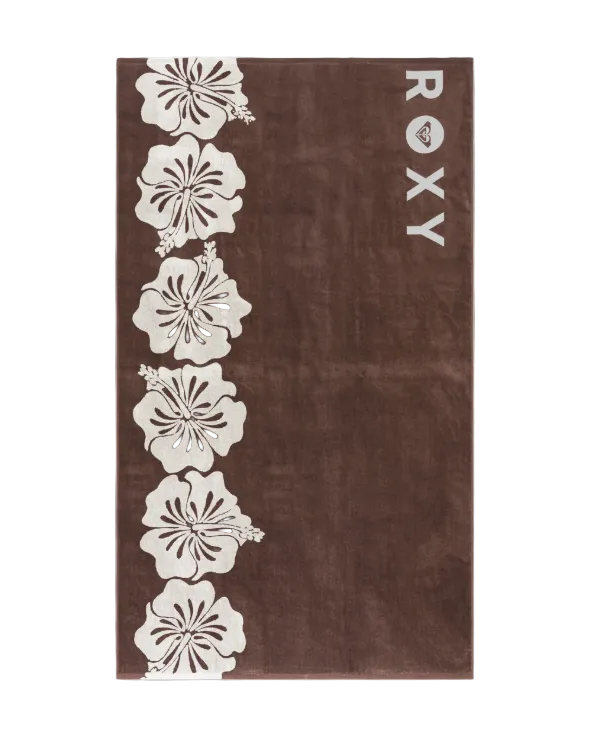 Brown towel with white floral patterns and 'ROXY' branding on a light gray background - velocity 21